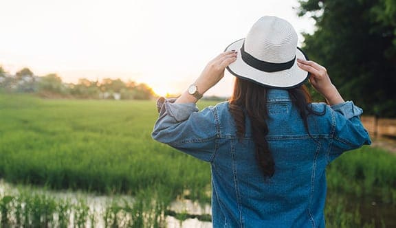 A woman with a hat on