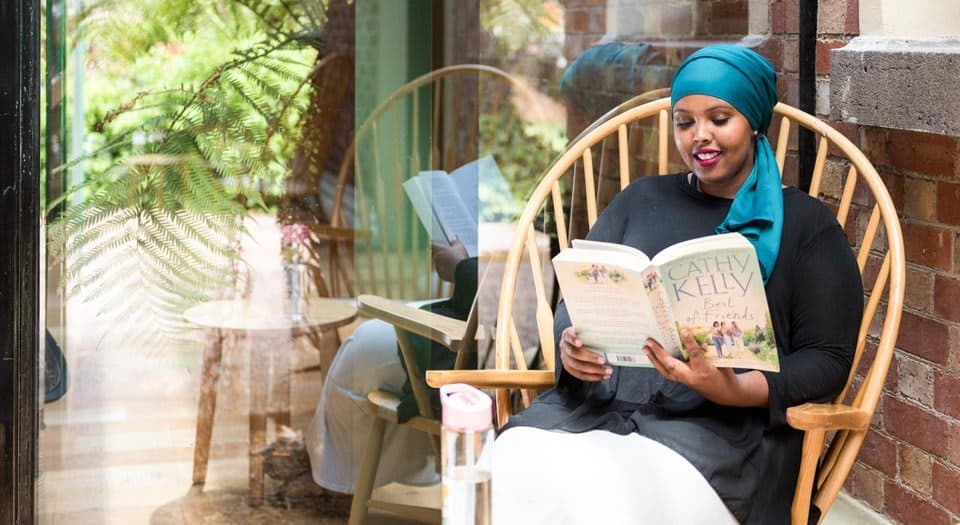 A woman reads a book