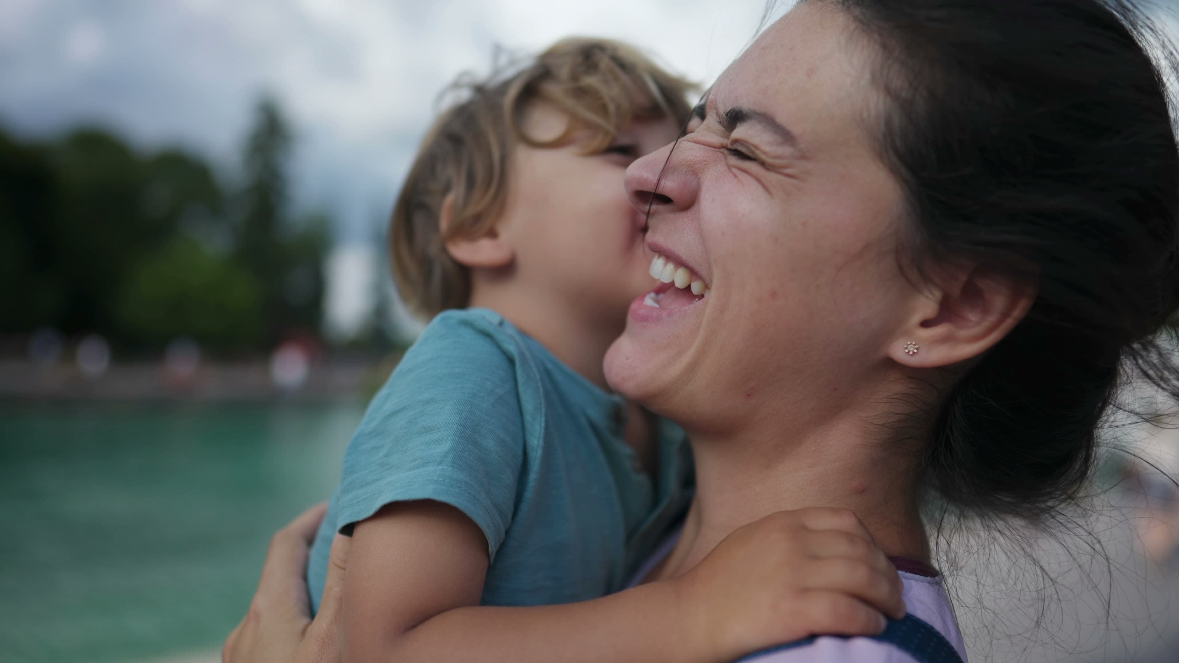 A mother and child embrace