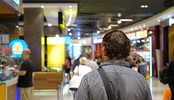 A man in a shopping centre