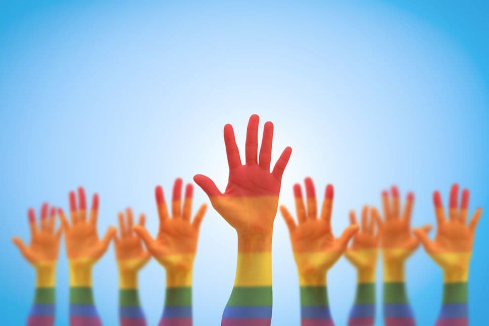 Colourful hands in the air